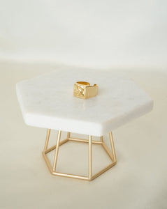 square shaped ring made with irregular texture desing on the front